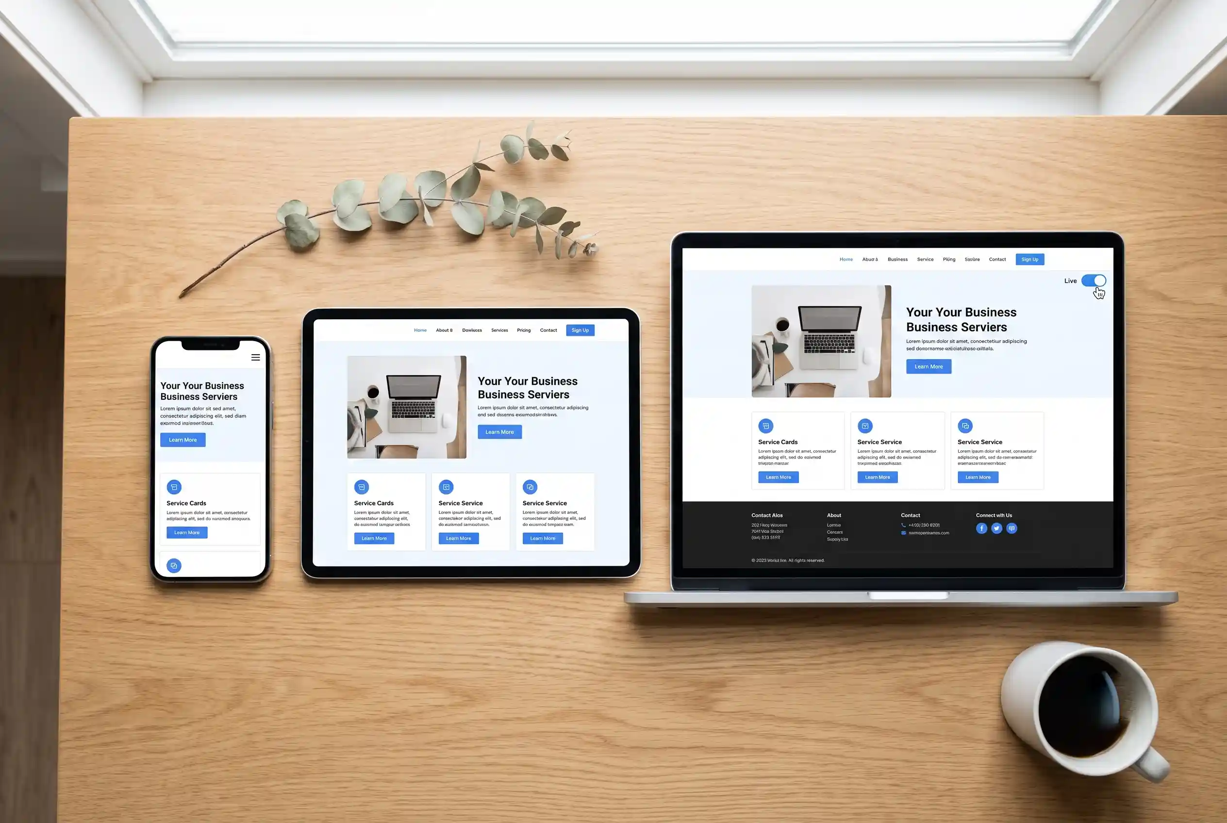 Three devices, laptop, tablet, and smartphone, arranged side by side on a desk, each displaying the same newly published WordPress business website in responsive layouts, with a "Coming Soon" toggle switched to "Live" visible on the laptop screen